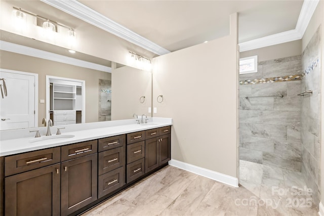 6107 Gold Springs Way, Denver, NC 28037 - bathroom featuring marble finish floors, double vanity, ornamental molding, a walk in shower, and a spacious closet