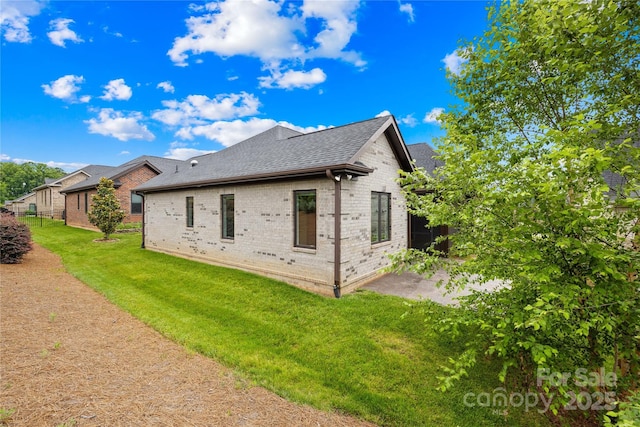6107 Gold Springs Way, Denver, NC 28037 - rear view of property with brick siding and a shingled roof