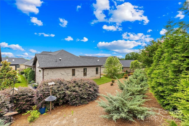 6107 Gold Springs Way, Denver, NC 28037 - view of home's exterior featuring brick siding and a shingled roof