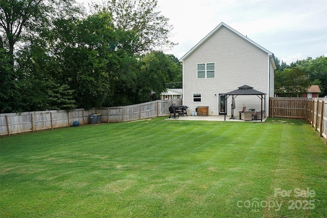 103 Springway Dr, Kannapolis, NC 28081 - rear view of house featuring a gazebo, a patio area, and a fenced backyard