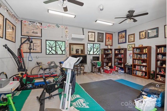 4 Sourwood Ln E, Asheville, NC 28805 - workout area featuring ceiling fan, concrete block wall, and a wall unit AC