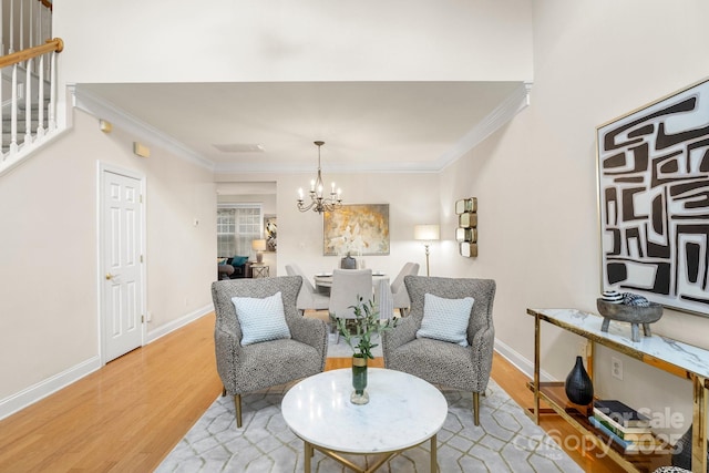 4442 Coventry Row Ct, Charlotte, NC 28270 - sitting room featuring a chandelier, wood finished floors, stairway, and ornamental molding