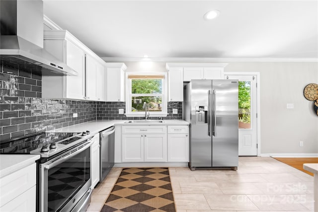 2919 Dunaire Dr, Charlotte, NC 28205 - kitchen with stainless steel appliances, wall chimney range hood, light countertops, tasteful backsplash, and crown molding