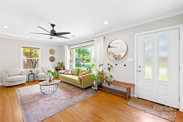 2919 Dunaire Dr, Charlotte, NC 28205 - living room featuring wood finished floors, ornamental molding, a ceiling fan, and recessed lighting