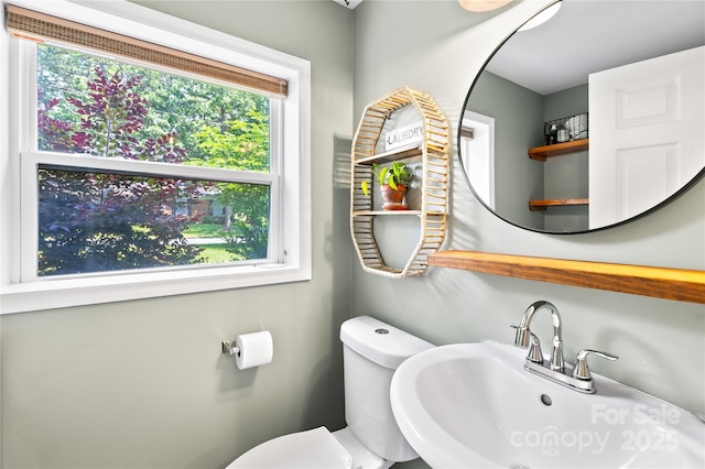 2919 Dunaire Dr, Charlotte, NC 28205 - half bath featuring a sink and toilet