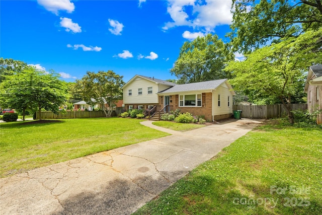 2919 Dunaire Dr, Charlotte, NC 28205 - split level home featuring driveway and brick siding