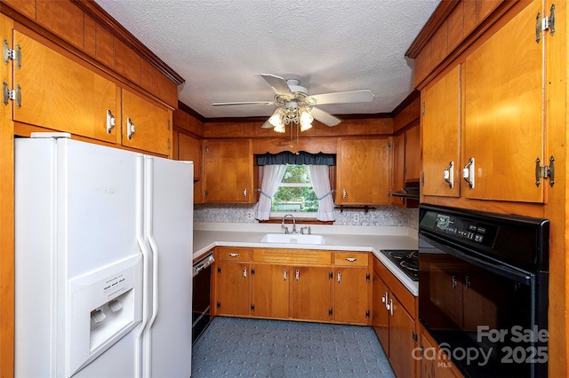 1216 Manchester Ln, Charlotte, NC 28227 - kitchen featuring black appliances, brown cabinets, a ceiling fan, light countertops, and a textured ceiling