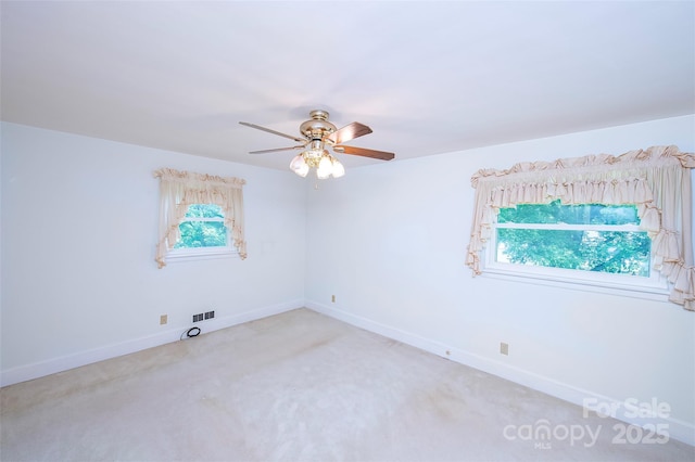 1216 Manchester Ln, Charlotte, NC 28227 - carpeted empty room with ceiling fan and baseboards
