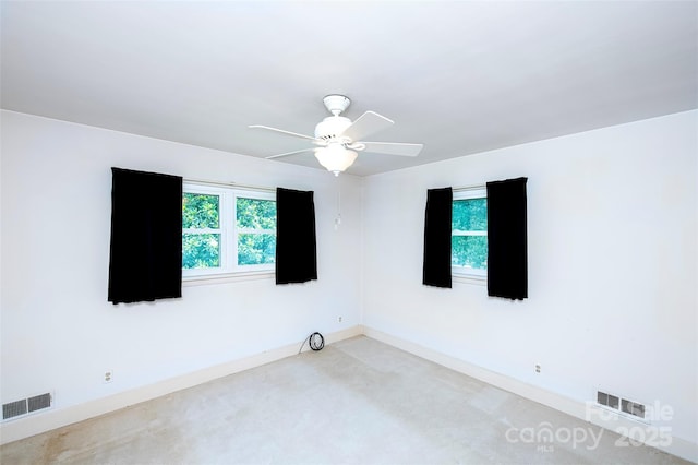 1216 Manchester Ln, Charlotte, NC 28227 - unfurnished room featuring a ceiling fan and light carpet