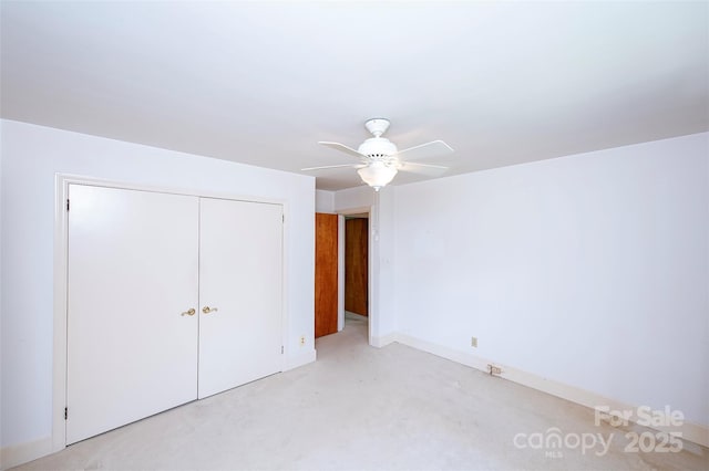 1216 Manchester Ln, Charlotte, NC 28227 - unfurnished bedroom with a closet, light colored carpet, and ceiling fan