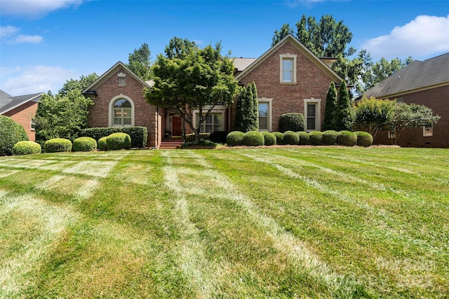 9027 Kirkley Ct, Charlotte, NC 28277 - view of front of home with brick siding and a front lawn
