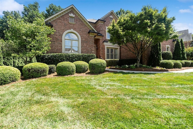 9027 Kirkley Ct, Charlotte, NC 28277 - traditional-style house featuring brick siding and a front lawn
