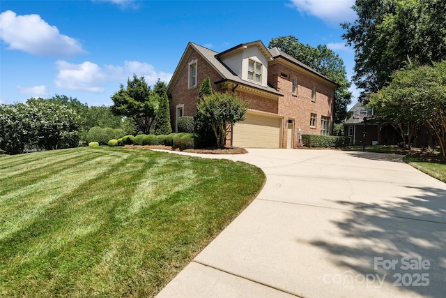 9027 Kirkley Ct, Charlotte, NC 28277 - view of property exterior with brick siding, an attached garage, concrete driveway, and a yard