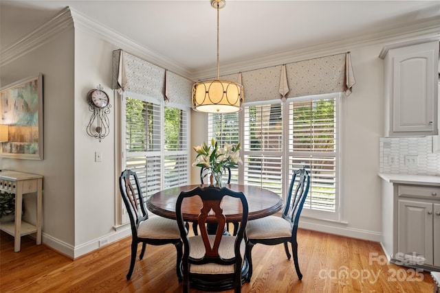 9027 Kirkley Ct, Charlotte, NC 28277 - dining room featuring crown molding and light wood-type flooring