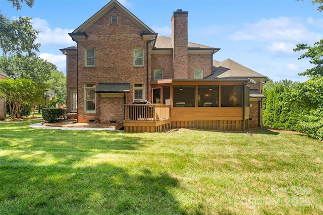 9027 Kirkley Ct, Charlotte, NC 28277 - rear view of house featuring a chimney, a sunroom, brick siding, a lawn, and a wooden deck
