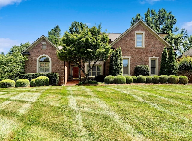 9027 Kirkley Ct, Charlotte, NC 28277 - view of front of property featuring brick siding and a front yard