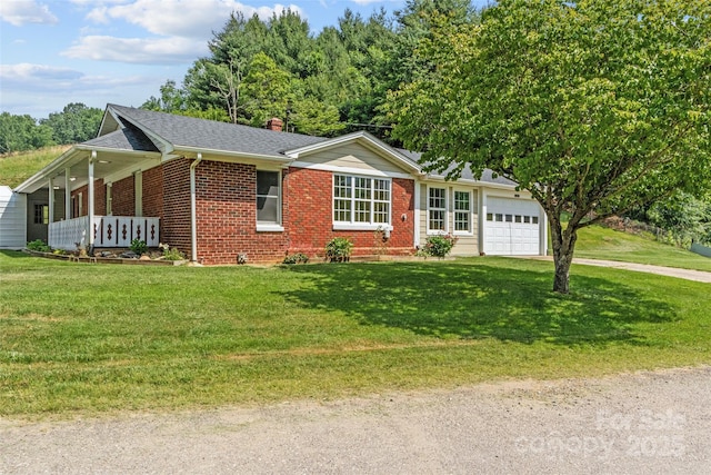 244 Carl Fox Rd, Burnsville, NC 28714 - single story home featuring brick siding, a garage, a front yard, a chimney, and a shingled roof