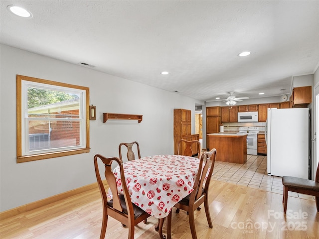 244 Carl Fox Rd, Burnsville, NC 28714 - dining area featuring recessed lighting, light wood finished floors, and a ceiling fan