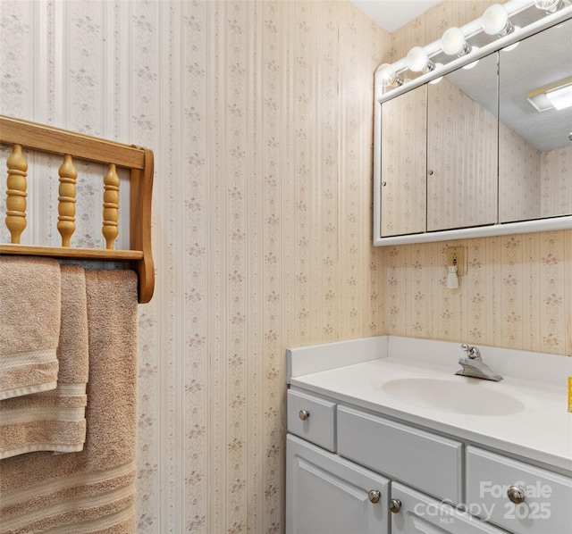 244 Carl Fox Rd, Burnsville, NC 28714 - bathroom with vanity and wallpapered walls
