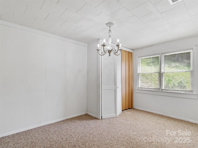 244 Carl Fox Rd, Burnsville, NC 28714 - carpeted empty room with a chandelier and baseboards