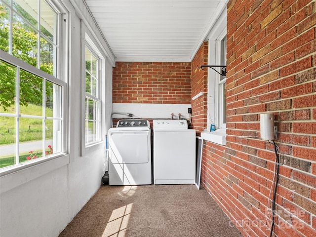 244 Carl Fox Rd, Burnsville, NC 28714 - laundry room featuring washing machine and clothes dryer, brick wall, and carpet
