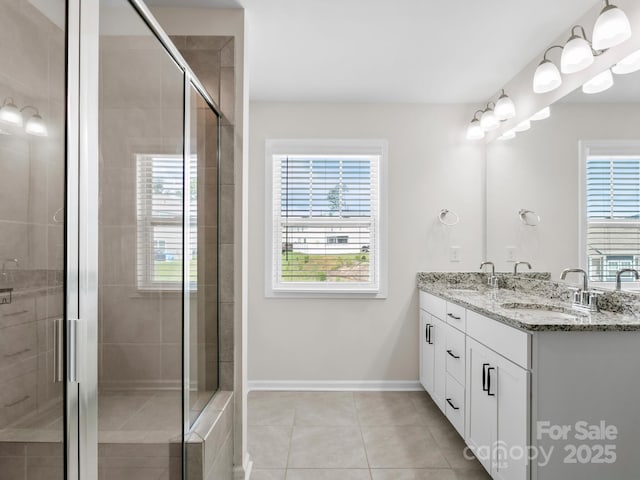 567 Big Sur Loop, Asheville, NC 28806 - bathroom with double vanity, tile patterned flooring, and a shower stall