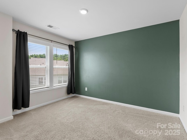 567 Big Sur Loop, Asheville, NC 28806 - spare room featuring baseboards and carpet flooring
