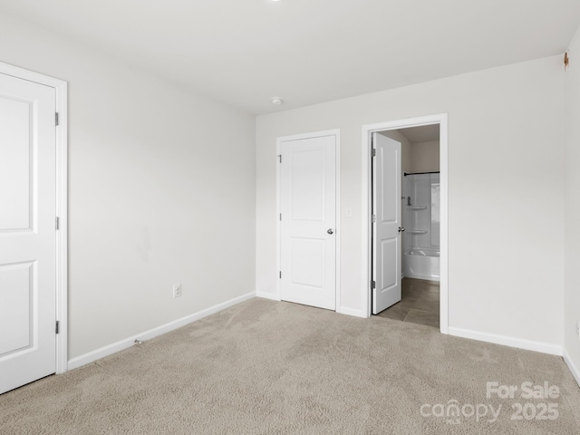 567 Big Sur Loop, Asheville, NC 28806 - unfurnished bedroom with carpet floors and connected bathroom