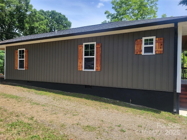 94 James St SW, Concord, NC 28025 - view of side of property with crawl space and roof with shingles