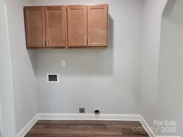 94 James St SW, Concord, NC 28025 - laundry area with washer hookup, dark wood-type flooring, arched walkways, cabinet space, and electric dryer hookup