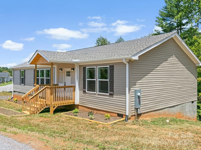 206 Walnut Branch Rd, Weaverville, NC 28787 - ranch-style home with roof with shingles, a front yard, and crawl space