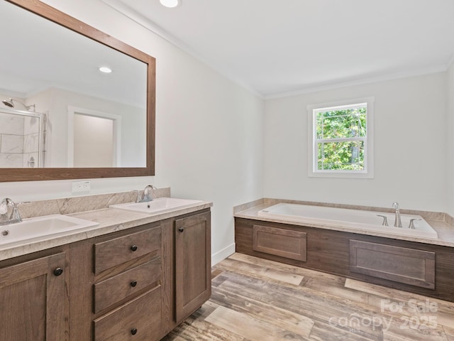 206 Walnut Branch Rd, Weaverville, NC 28787 - full bath with a garden tub, a stall shower, double vanity, wood finished floors, and crown molding