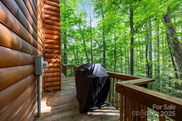 83 Log Cabin Dr, Maggie Valley, NC 28751 - wooden deck featuring a grill and a forest view