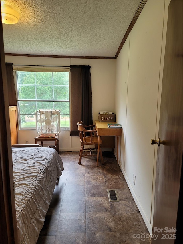 111 Crystal Creek Dr, China Grove, NC 28023 - bedroom featuring crown molding and a textured ceiling