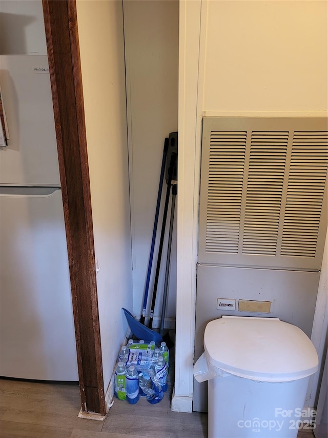 111 Crystal Creek Dr, China Grove, NC 28023 - detailed view of freestanding refrigerator and wood finished floors