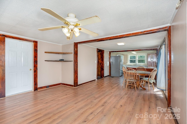 439 Neisler Rd, Concord, NC 28025 - dining space with light wood finished floors, a ceiling fan, and ornamental molding