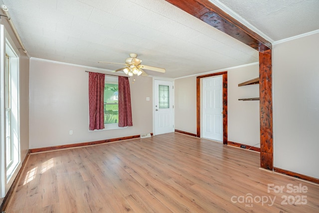 439 Neisler Rd, Concord, NC 28025 - unfurnished living room with crown molding, light wood-type flooring, and a ceiling fan