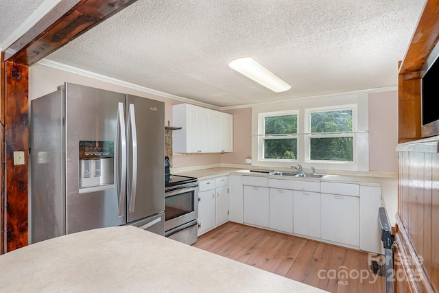439 Neisler Rd, Concord, NC 28025 - kitchen featuring stainless steel appliances, light wood-type flooring, a textured ceiling, crown molding, and light countertops