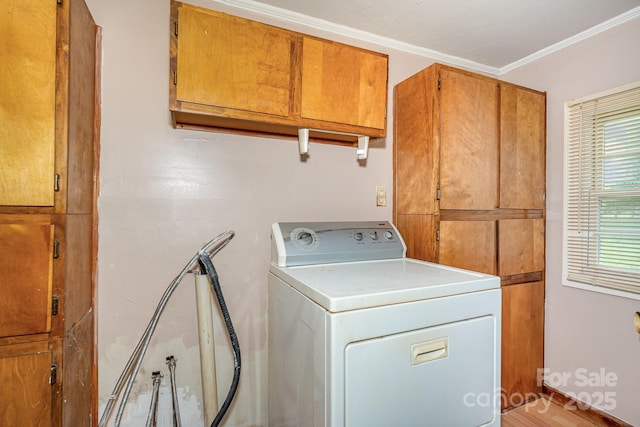 439 Neisler Rd, Concord, NC 28025 - washroom featuring cabinet space, washer / clothes dryer, and crown molding