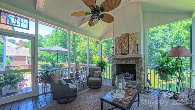 1240 Fawn Ridge Rd NW, Concord, NC 28027 - sunroom / solarium featuring a ceiling fan, vaulted ceiling, and healthy amount of natural light