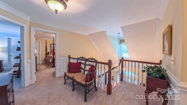 1240 Fawn Ridge Rd NW, Concord, NC 28027 - hallway with carpet floors, an upstairs landing, crown molding, and a wainscoted wall