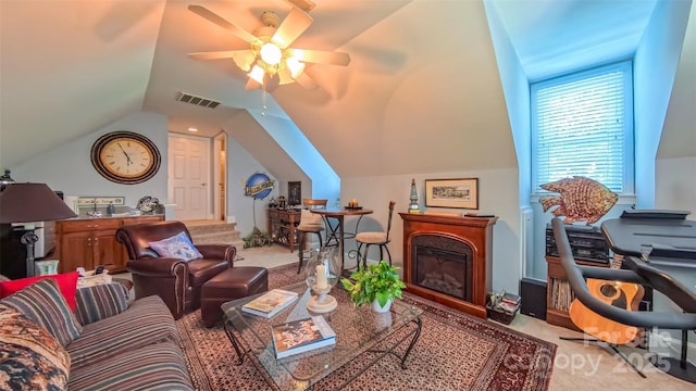 1240 Fawn Ridge Rd NW, Concord, NC 28027 - living area featuring carpet flooring, ceiling fan, lofted ceiling, and a glass covered fireplace