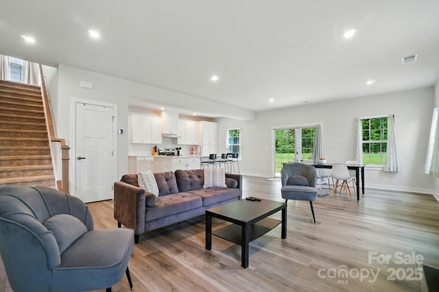 812 Dogwood Creek Ln, Indian Trail, NC 28079 - living area with light wood-style floors, stairway, and recessed lighting