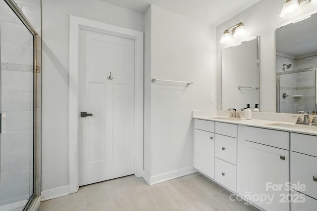 812 Dogwood Creek Ln, Indian Trail, NC 28079 - full bathroom featuring a stall shower, double vanity, and tile patterned floors