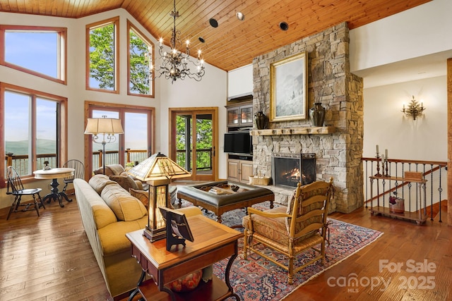 197 Cherry Knob Dr Unit 23, Mars Hill, NC 28754 - living area featuring wooden ceiling, high vaulted ceiling, healthy amount of natural light, hardwood / wood-style floors, and a fireplace
