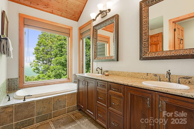 197 Cherry Knob Dr Unit 23, Mars Hill, NC 28754 - bathroom featuring double vanity, a garden tub, lofted ceiling, and wood ceiling