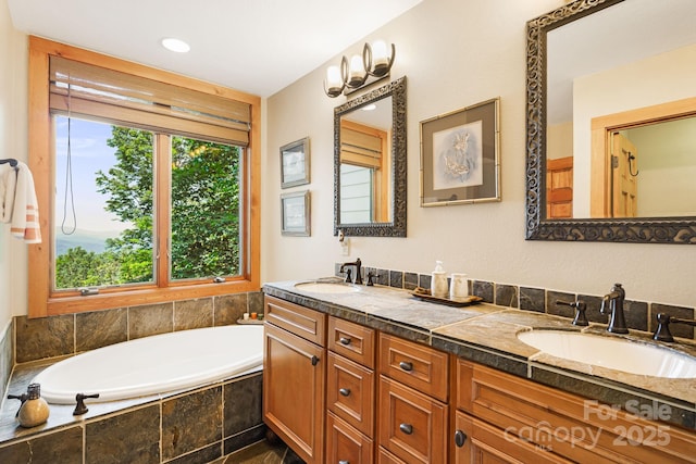 197 Cherry Knob Dr Unit 23, Mars Hill, NC 28754 - bathroom featuring double vanity and a garden tub