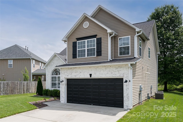 89 Woodfern Rd, Fletcher, NC 28732 - traditional-style home featuring an attached garage, driveway, and roof with shingles