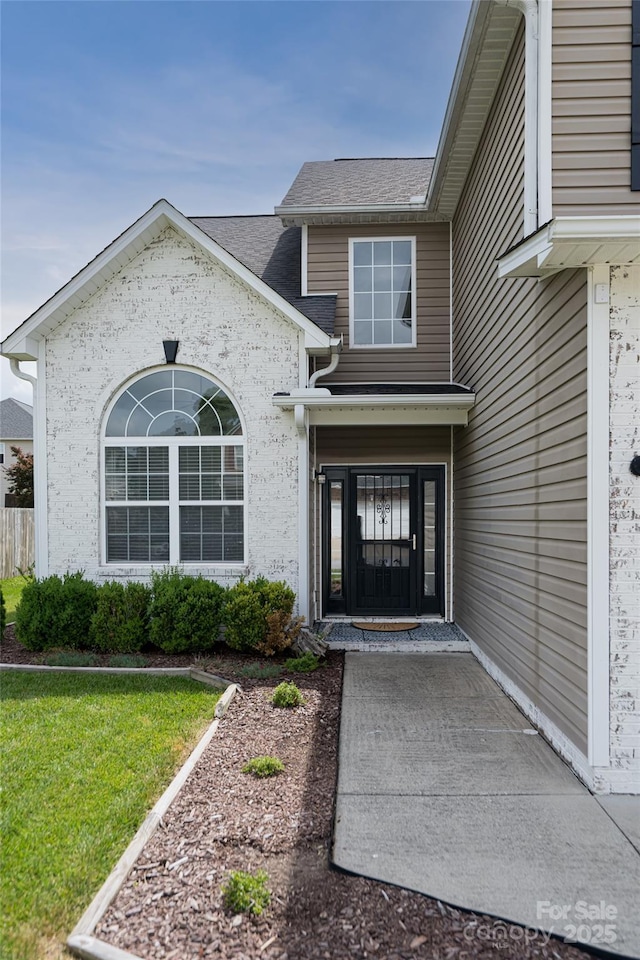 89 Woodfern Rd, Fletcher, NC 28732 - entrance to property featuring roof with shingles and a yard