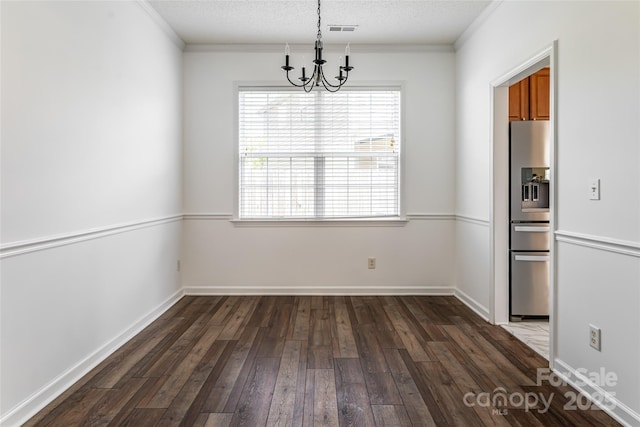 89 Woodfern Rd, Fletcher, NC 28732 - unfurnished dining area with a chandelier, dark wood-style floors, ornamental molding, and a textured ceiling